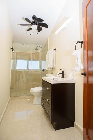 Upstairs bathroom features all new tile, floor, fixtures, sink, etc. 