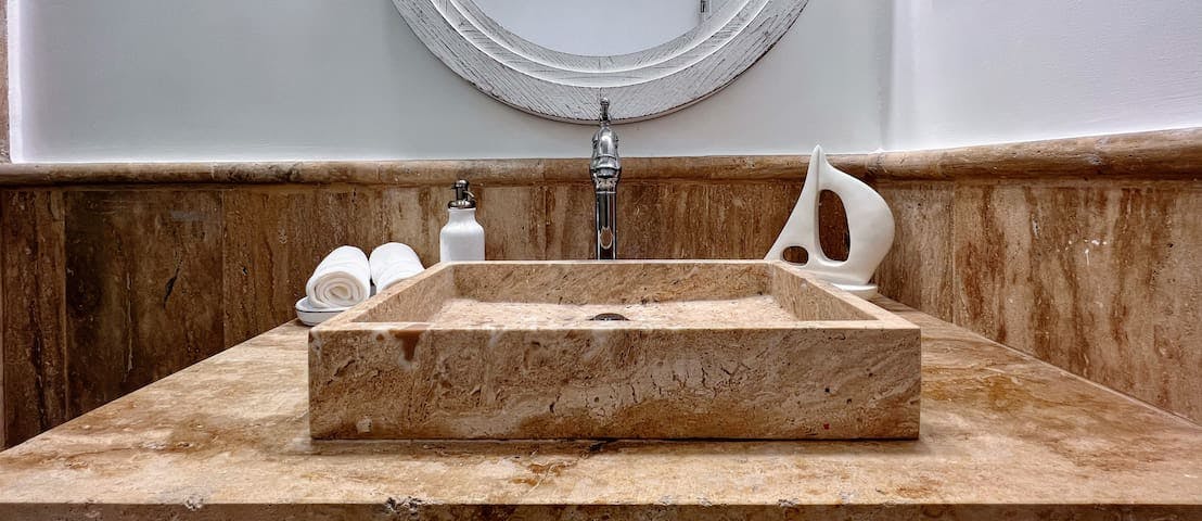 Luxurious bathroom sink ready to support your daily and nightly self-care routines.
