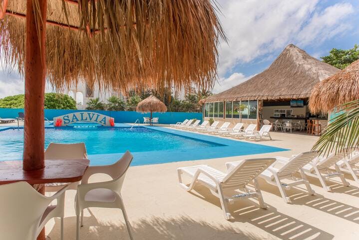 Pool features loungers, palapays, small restaurant and bars. Kiddie pool.