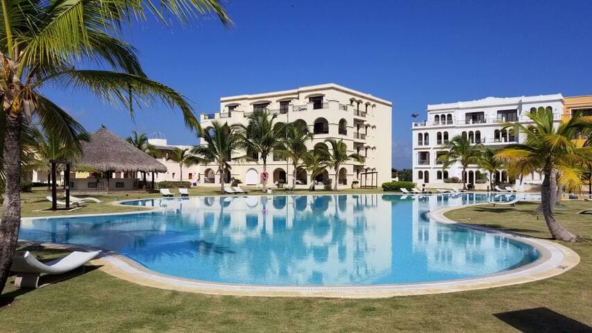 Serene pool seen during daylight hours.
Closest pool (2 min walk) to your accommodations.