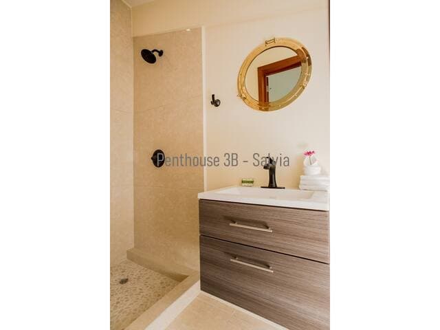 Upstairs bathroom with new shower.