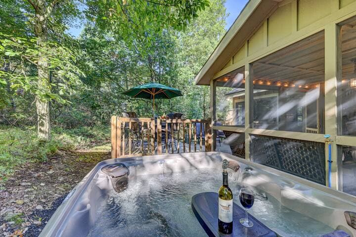 The home has a hot tub with woodland views off the back deck.