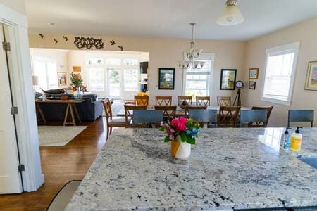 The view from the kitchen, through the dining room, into the living room