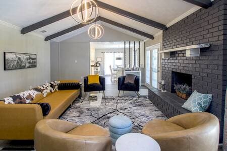 Leather swivel chairs, vaulted ceilings, and a luxurious modern design.