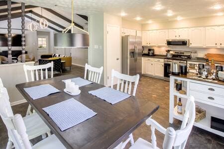Semi open concept living room, dining room, and kitchen. Lots of space and natural light!