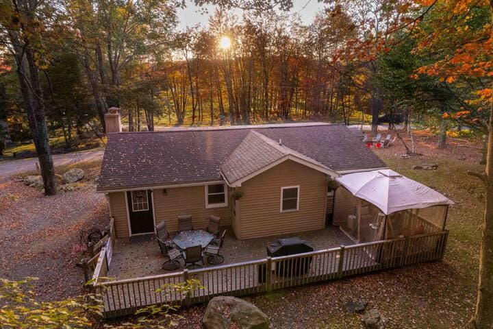 The large back deck has an outdoor dining area, propane grill, and screened gazebo. The deck is fully enclosed with a gate- great for pets and toddlers!