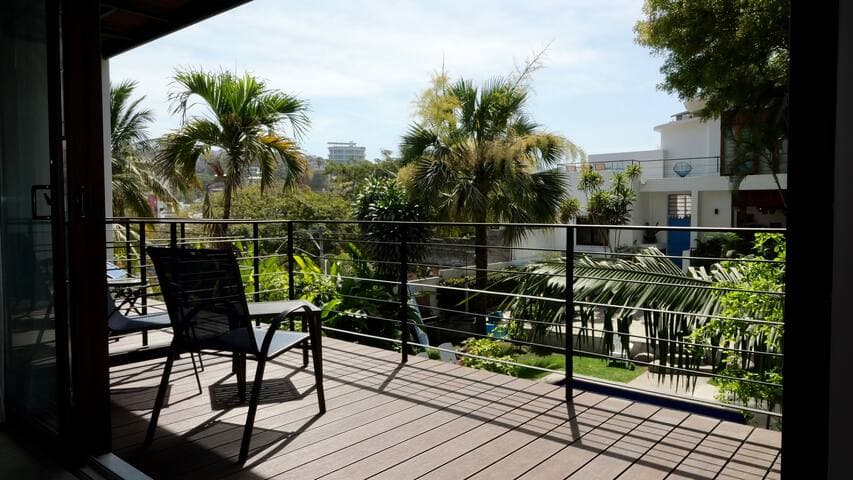 Spacious living room patio. Great for drinking a cocktail or reading a book.