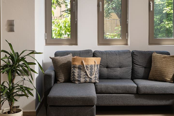 Where relaxation meets style. This plush sofa invites you to unwind after a day of exploration.