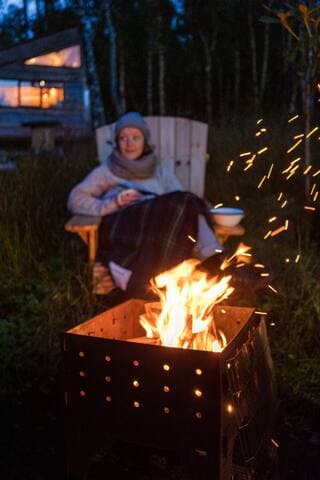 The Firepit/BBQ and hand-made Adirondack chairs