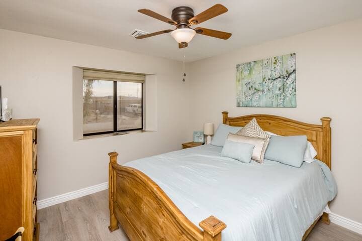 2nd bedroom with a king bed and plenty of closet and drawer space