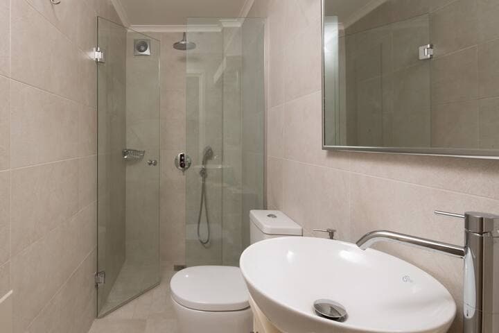 The bathroom on the lower level, adjacent to the Bedroom 1.