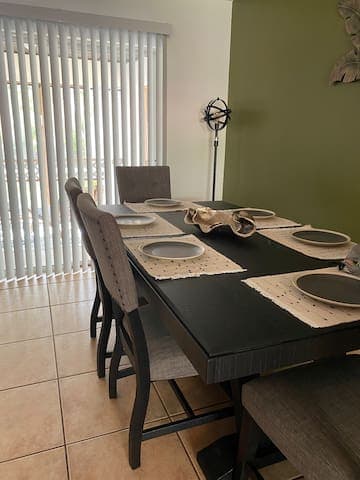 Enjoy gathering with family and friends at the dining table with seating for 6.