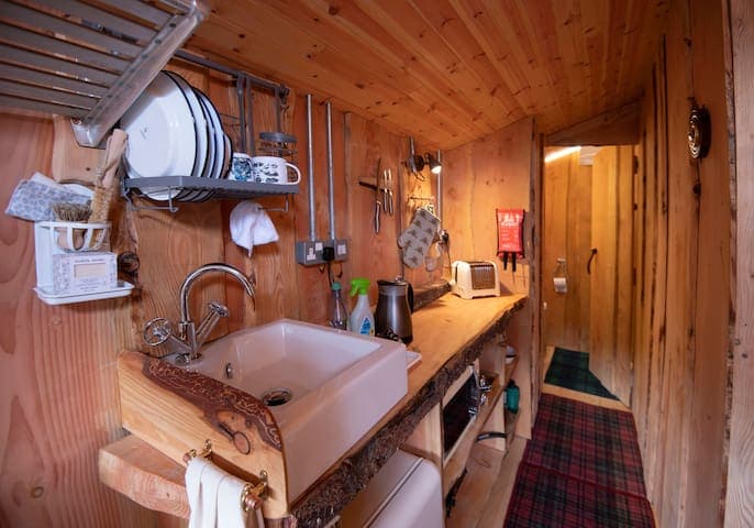 We have tried to use as little plastic in the Bothies as possible, choosing metal and (locally sourced) wood instead for less impact on the environment. The kitchens were designed by us and are made from slabs of Douglas Fir