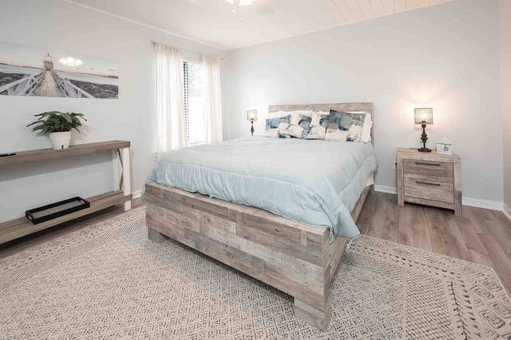 The first-floor bedroom provides a spacious closet, dressers and Amazon Fire TV to relax and kick back.