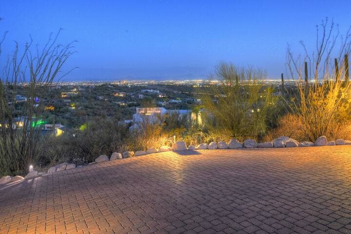 Enjoy the city lights from most windows in the house, including the driveway