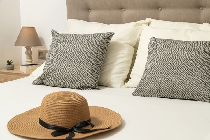 The double bed invites you to a night of quiet repose, offering a modest retreat after a day of exploration.