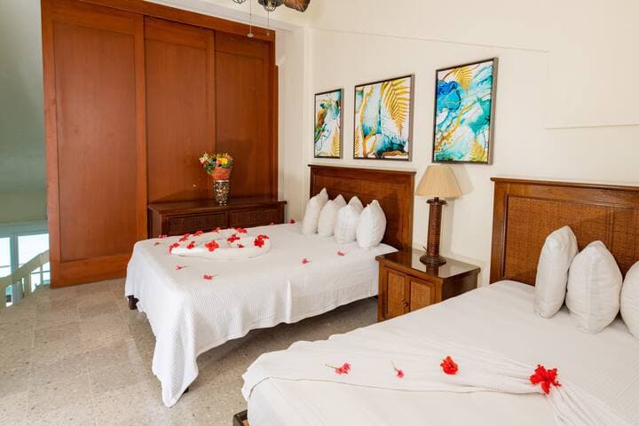 Second floor bedroom has two queen beds and sliding doors for privacy.
Note, they don't close all the way but provide a separation from the rest of the space.