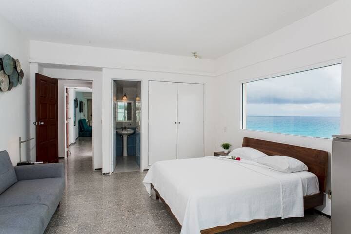 Second bedroom with attached bathroom and closet. BLACKOUT CURTAINS INSTALLED