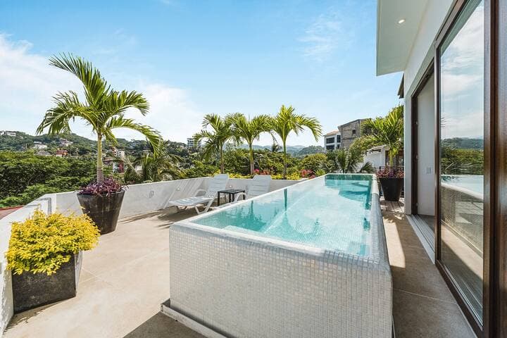 Luxe Penthouse; 2 Pools, Ocean Views at Casa Yaka